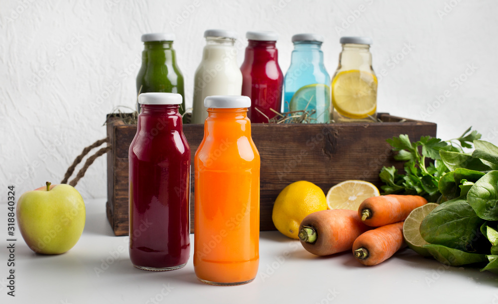 Different detox drinks with fresh components on white Different detox drinks with fresh components on white