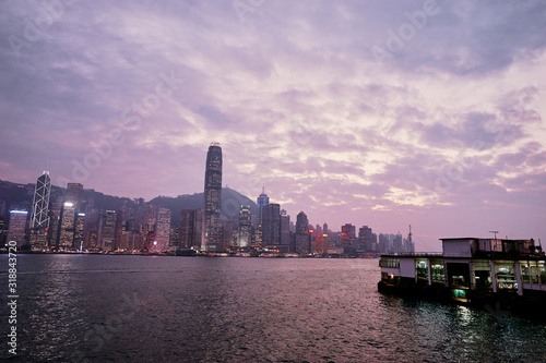 Hong Kong skyline cityscape downtown skyscrapers over Victoria Harbour at sunset time. Hong Kong, China. The 12th of December 2017.