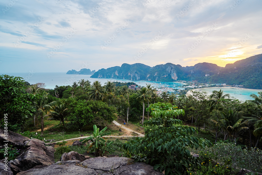 Wonderful sunset on Phi Phi Don island view point. Beautiful landscape with tropical sea lagoon.