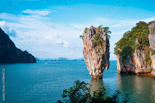 Travel by Thailand. Amazing scenery natural landscape of James Bond island Phang-Nga bay, Water tours of Phuket, Famous landmark and famous travel destination of Asia, Summer holiday vacation trip. photo