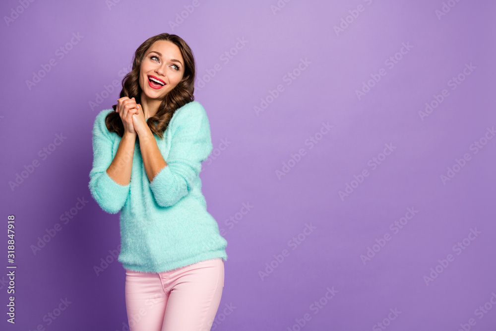 Portrait of excited cute sweet pretty girl look copyspace enjoy her desire want wish fists feel rejoice wear pink pants trousers isolated over violet pastel color background Portrait of excited cute sweet pretty girl look copyspace enjoy her desire want wish fists feel rejoice wear pink pants trousers isolated over violet pastel color background