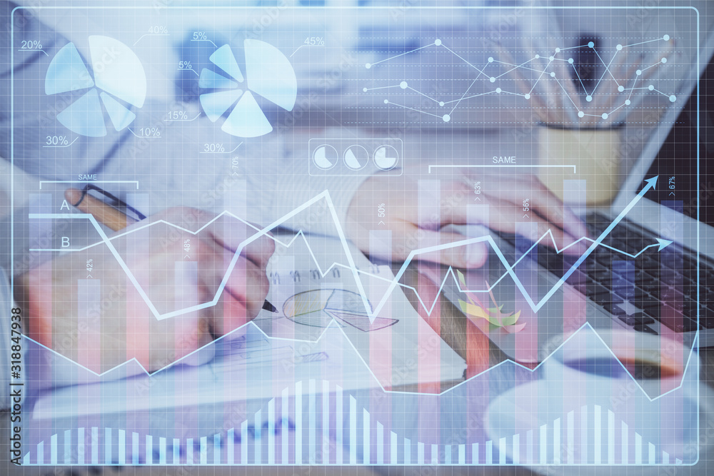 Multi exposure of stock market graph with man working on laptop on background. Concept of financial analysis. Multi exposure of stock market graph with man working on laptop on background. Concept of financial analysis.