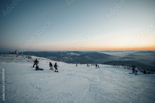 Sheregesh, Russia 06/01/2020. Ski resort against sunset. Beautiful view mountain in winter.