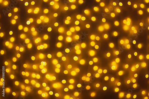 Abstract blur golden bokeh light Christmas holiday background