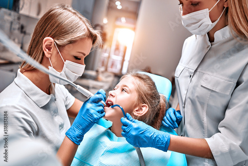 Young girl at dentist, dental treatment
