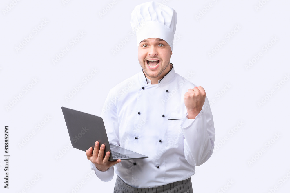Excited Cook Guy Holding Laptop Gesturing Yes, Studio Shot Excited Cook Guy Holding Laptop Gesturing Yes, Studio Shot