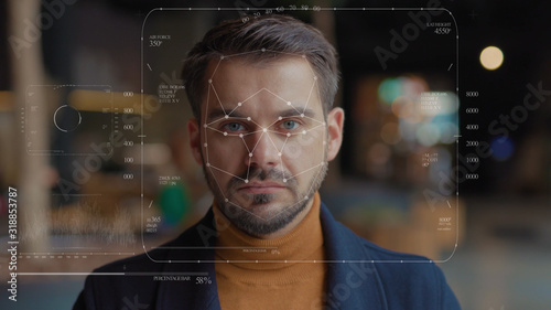 Future. Face Detection. Technological 3d Scanning. Biometric Facial Recognition. Face Id. Technological Scanning of the Face of Handsome Businessman for Facial Recognition. Shoted by Arri Alexa Mini photo