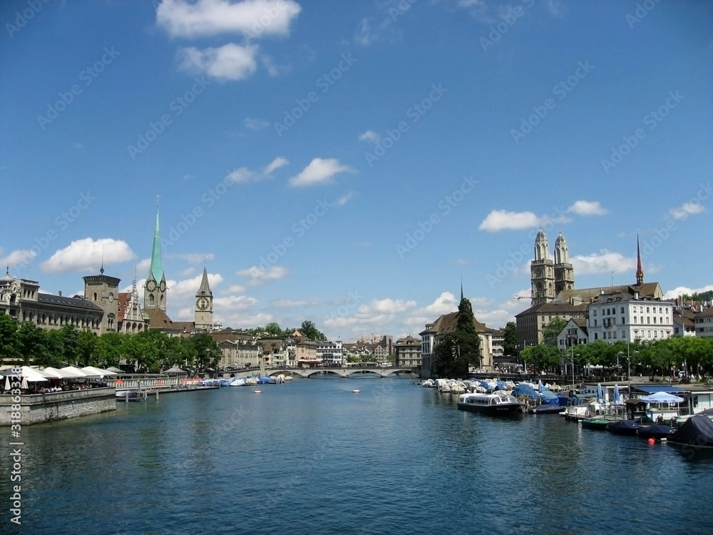 A beautiful city view of Zurich and Limmat River on a sunny day.