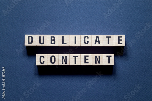 Dublicate content word concept on cubes photo