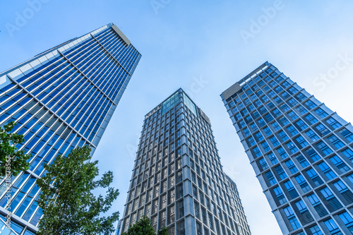 Perspective view of contemporary glass building skyscraper