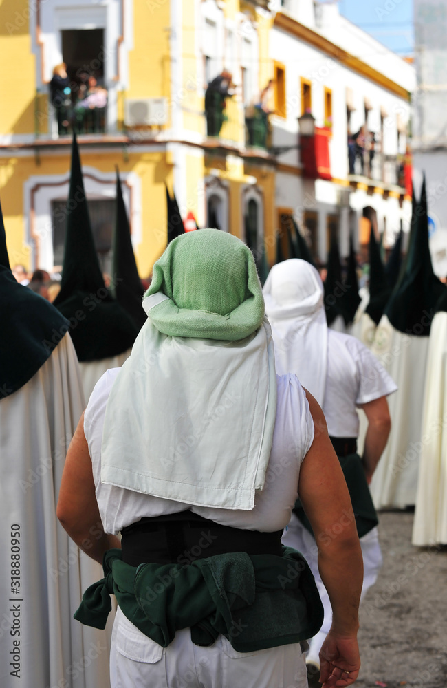 Holy Week (Semana Santa) in Seville. Bearers (costaleros) of the brotherhood of the Hope (Esperanza) of Triana. Holy Week (Semana Santa) in Seville. Bearers (costaleros) of the brotherhood of the Hope (Esperanza) of Triana.