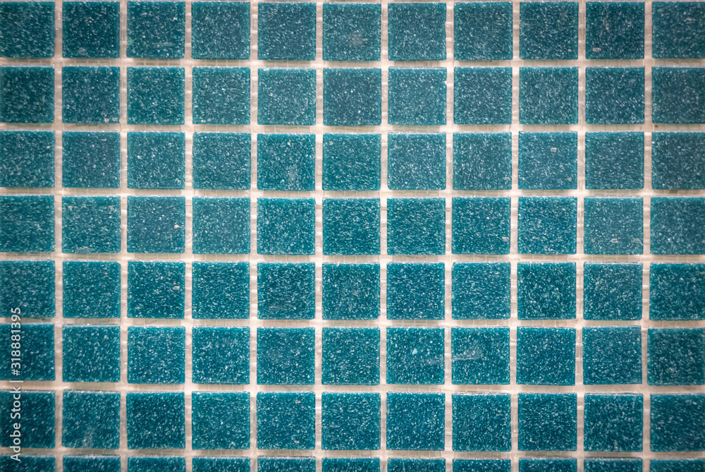 Blue ceramic mosaic on the wall as background Blue ceramic mosaic on the wall as background