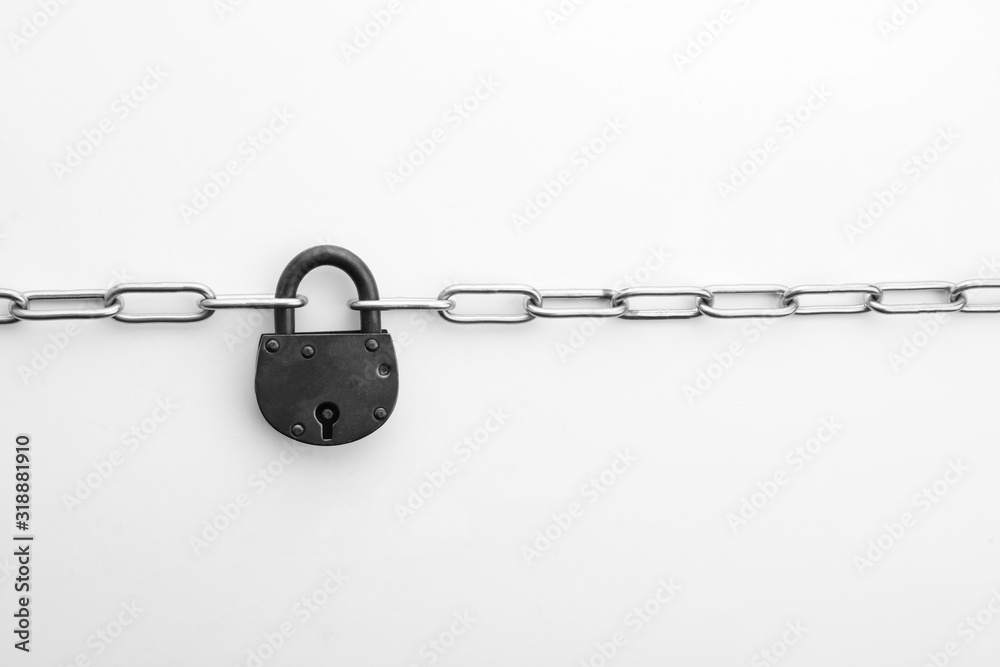 Steel padlock and chain isolated on white, top view. Safety concept Steel padlock and chain isolated on white, top view. Safety concept