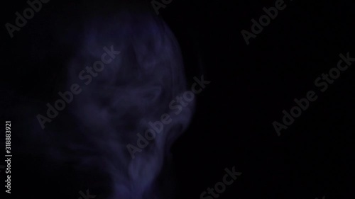 Motion of white steam smoke overlay effect on solid black background with abstract blur swirl wave motion for pollution, wildfire, vapor cigarette, gas, dry ice, warm hot food, boilling noodle soup