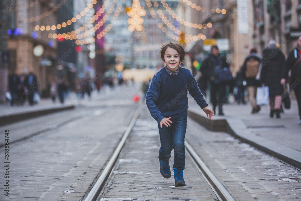 Sweet school child, walking on a street in Helsinky