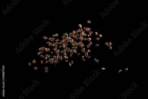 Coffee Beans splashing isolated on black background