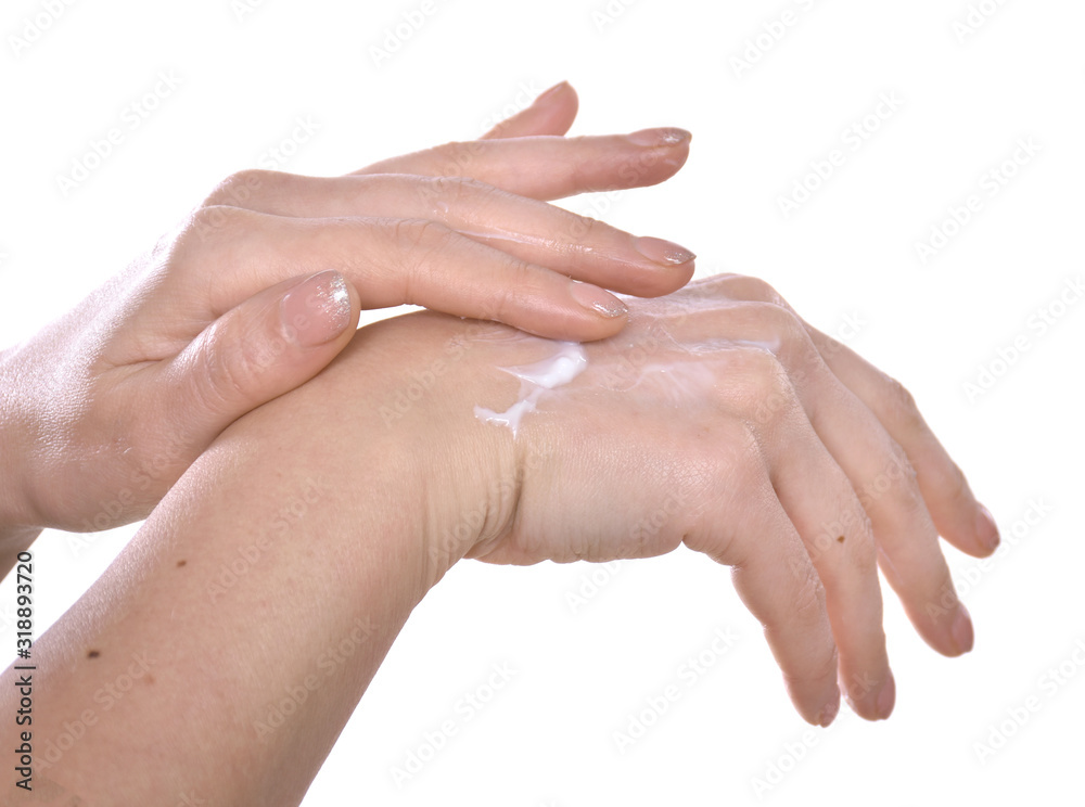 Closeup shot of beautiful female hands applying moisturiser Closeup shot of beautiful female hands applying moisturiser