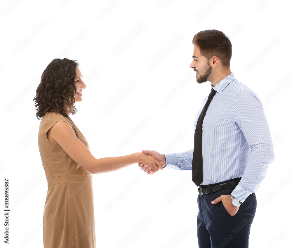 Portrait of young business people shaking hands on white background