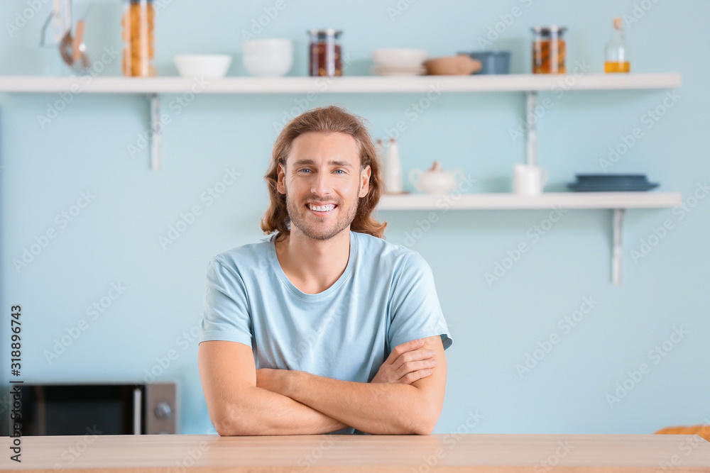Handsome man in kitchen at home Handsome man in kitchen at home