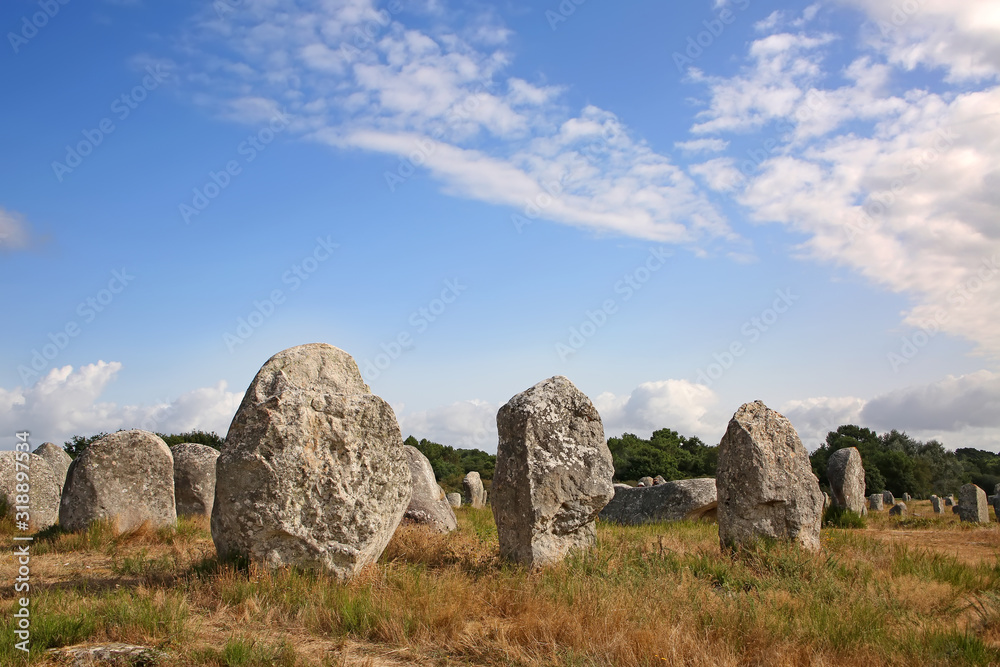 Thousands of prehistoric standing stones spread across three alignments at Carnac, Brittany, northwest France. Thousands of prehistoric standing stones spread across three alignments at Carnac, Brittany, northwest France.