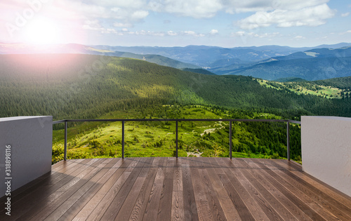 Balcony view of  mountains. Landscape. Sunny Day. Terrace with a beautiful view. Background with beautiful landscape.
