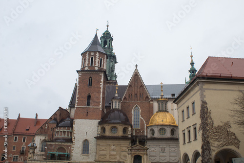 The Wawel Royal Castle close-up in winter time, located on the high bank of the Vistula, includes a royal castle, a cathedral, and a system of castle fortifications.