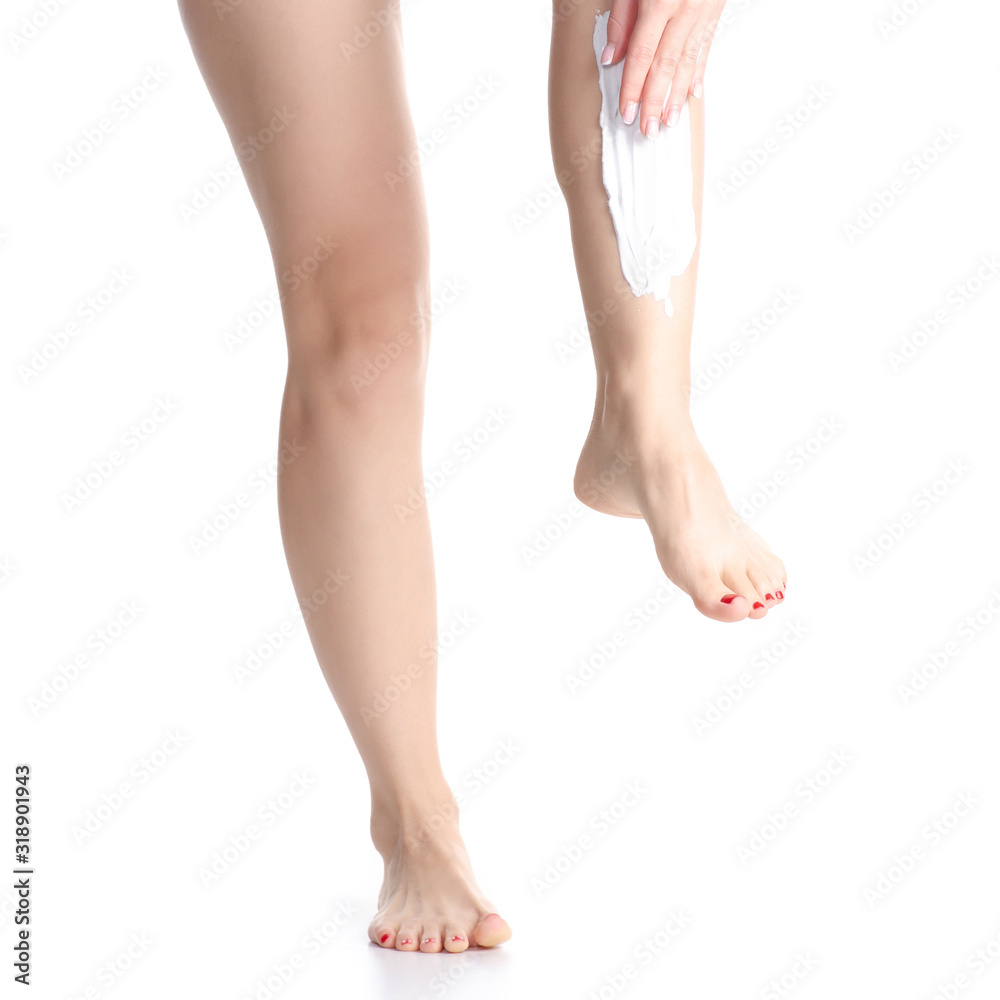 Female legs shaving foam razor on white background isolation Female legs shaving foam razor on white background isolation