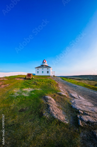 Cape Spears Lighthouse  Newfoundland  Canada. This picture was shot during sunrise in summer season using fisheye lens. 