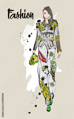 Beautiful young woman in ethnic style.. Hand drawn stylish woman portrait. Fashion lady. Festive outfit. Sketch. Fashion model posing in dress. Hand drawn fashion woman.