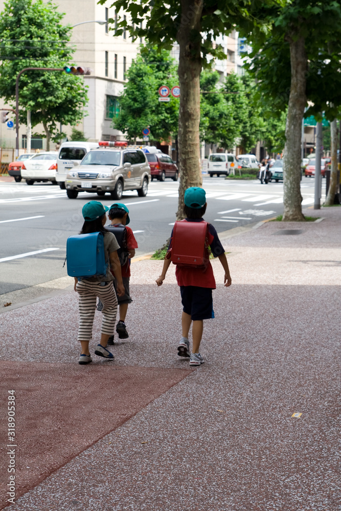 Japanese children walking to school in Tokyo Stock Photo | Adobe Stock