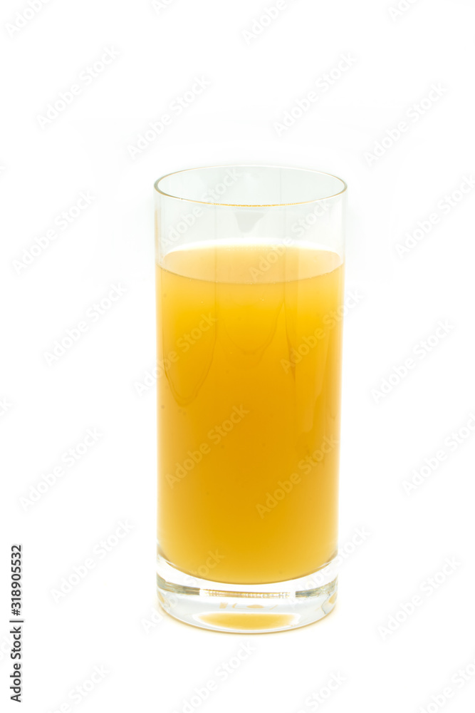 glass of naturally cloudy apple juice in front of white background glass of naturally cloudy apple juice in front of white background