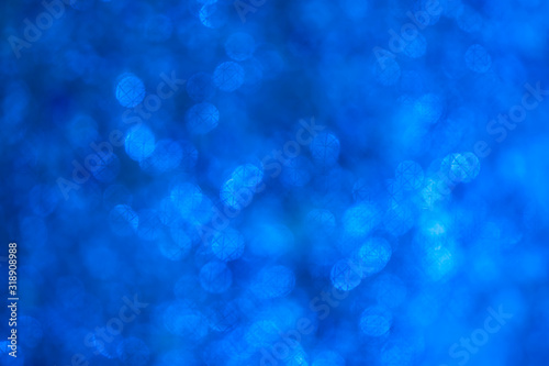 Blue bokeh background with light.