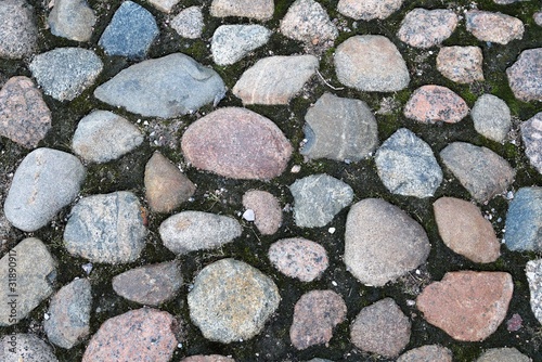 St. Petersburg, Russia, January 2020. A fragment of an old pavement of large cobblestones.