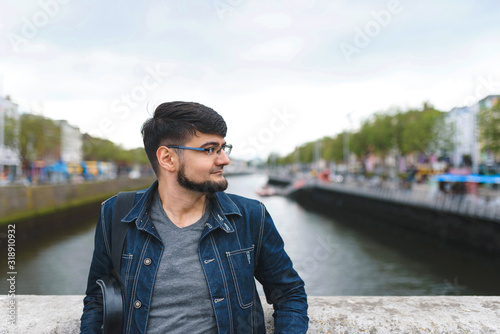 tourist standing on bridge
