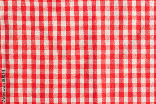 red fabric texture of checkered picnic blanket