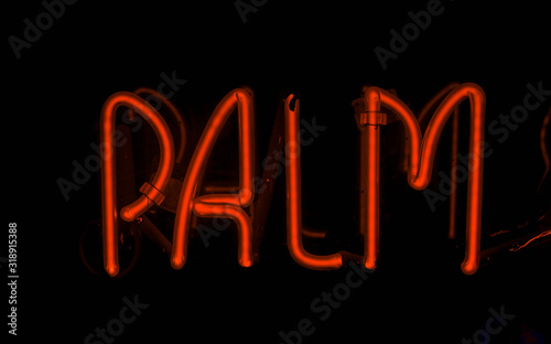 red palm neon sign isolated black background