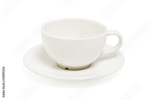 Empty white coffee cup on plate top view isolated on white background. With clipping path