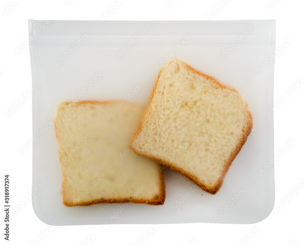 sliced bread in takeaway package flat lay on a white background