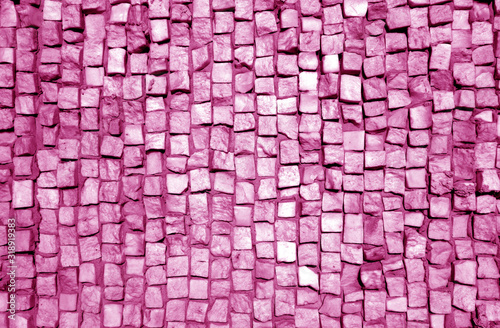 Stone pavement surface in pink tone.