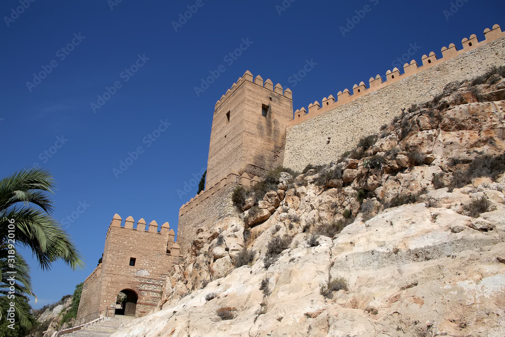 Entrance to the Alcazaba Castle, looking at the fortified walls & gateway, Almeria Spain