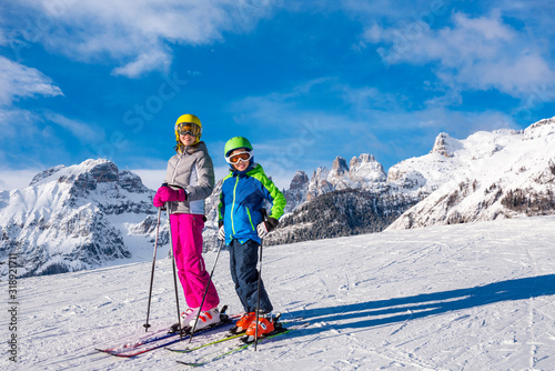 Children have fun on the high altitude ski slope - Alps