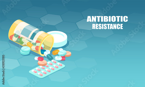Vector of antibiotic capsules spilling out bottle. photo
