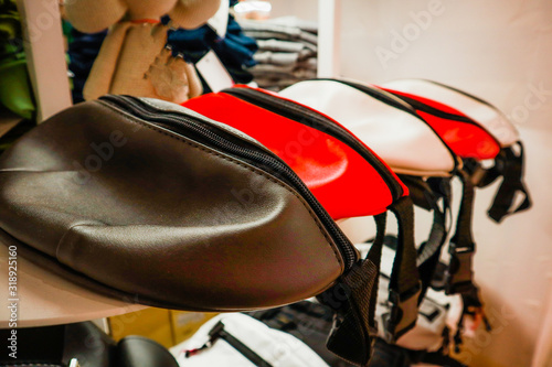 Stylish handbags on the belt. Eco leather. Black, white red. Style and fashion. Minimalism. Instagram content.