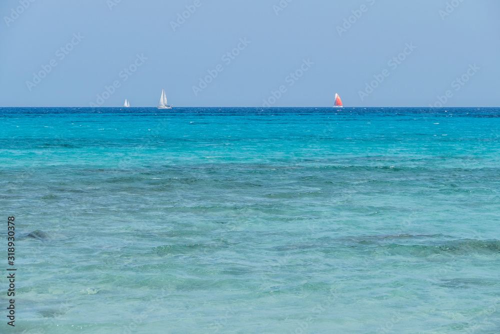 The beautiful beach of Berchida in Siniscola in Sardinia with white sand and turquoise sea The beautiful beach of Berchida in Siniscola in Sardinia with white sand and turquoise sea