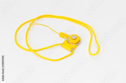 Yellow neck strap lanyard for cell phone or camera on white background - Image