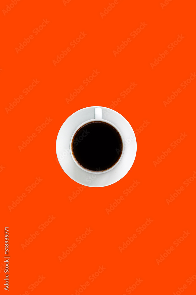 Black coffee espresso in white cup and saucer, bright red color background with empty space for text, unhealthy food concept Black coffee espresso in white cup and saucer, bright red color background with empty space for text, unhealthy food concept
