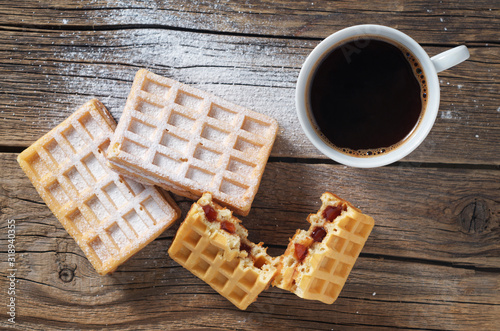 Waffles with jam and coffee