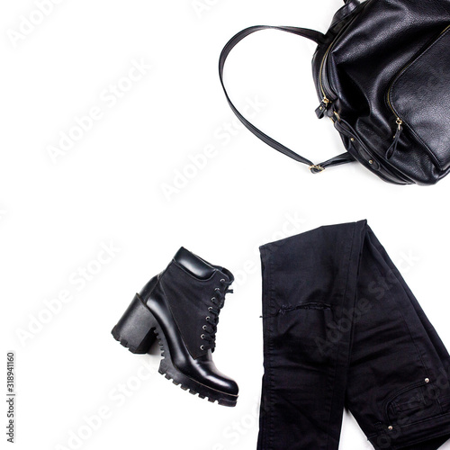 fashion female set with a backpack, jeans and shoes. Flat lay, top view