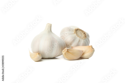 Fresh garlic bulbs and slices isolated on white background