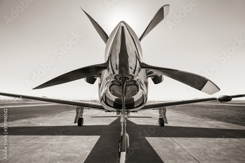 sportsplane on a runwayis waiting for take off photo